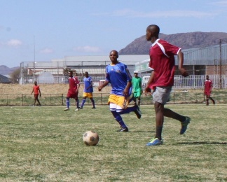 ON THAT BALL: Akhona Zongo of Boston City Campus and Business College looks to pass through Komani Hospital Security players during the Lilitha College Soccer Tournament on Saturday Picture: BHONGO JACOB