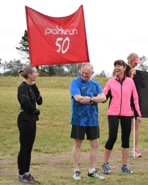 Celebrating his 50th parkrun in Stutterheim, from left, Caron Williams, runner Alan and his wife, Lesley Koopowitz 