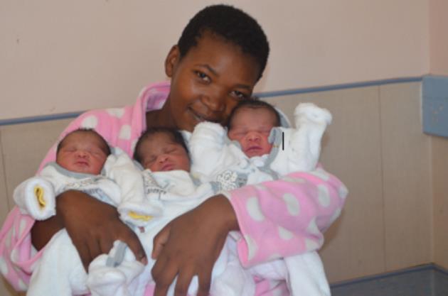 TRIPLE The Joy: Dunyiswa Makhonxa shares a cuddle with her three little girls born at Frontier Hospital in Komani last week Picture: ABONGILE SOLUNDWANA