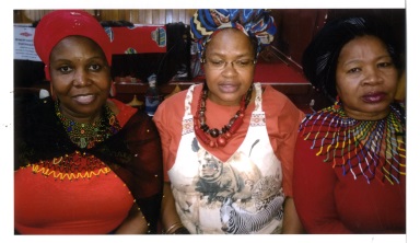 Having fun celebrating their heritage at the Nonzwakazi Women's Manyano were, from left, Rebecca Leferrere, Zine May and Nomvuyo Njovane 